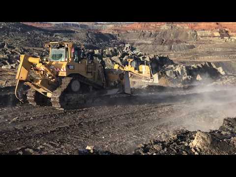 Two Caterpillar D9T Bulldozers Working On Coal Mines