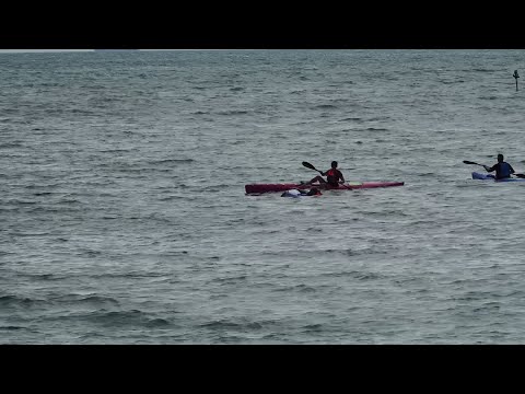 Surfski newbie towed home!
