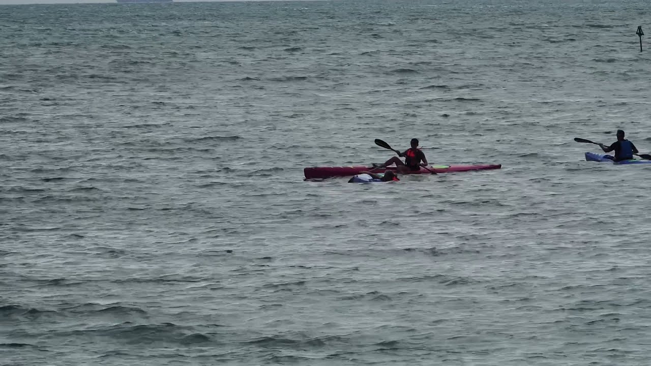 Surfski newbie towed home!