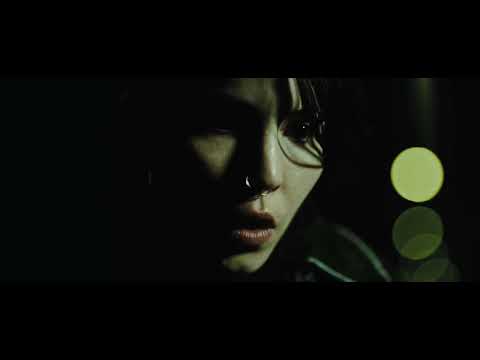 Trailer shot: Lisbeth rides through night streets; the score’s motif outlines her agency