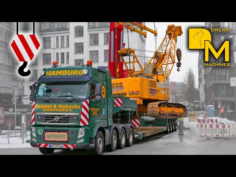 LIEBHERR LTM 1450-8.1 Mobilkran hebt Liebherr Seilbagger auf Schwertransport Volvo 8x4