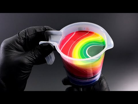 An Artist Uses a Measuring Cup to Make Fluid Abstract Art