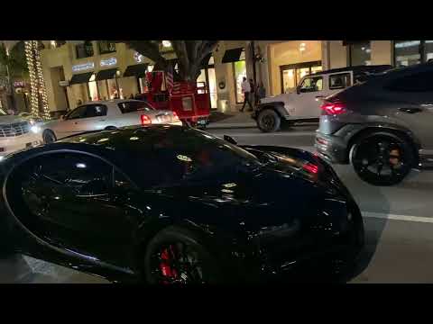 Bugatti Chiron and White Ferrari F8