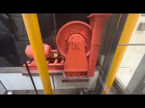 Epic All Glass Bottom Drive Traction Elevators