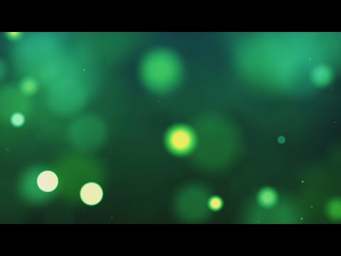 Green,Orange, Blue, Yellow bright circles. Looped Green animated background. Relaxing Screensaver.