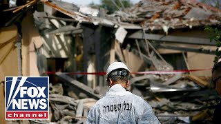 Israel strike targets in Gaza in response to Hamas rocket attack