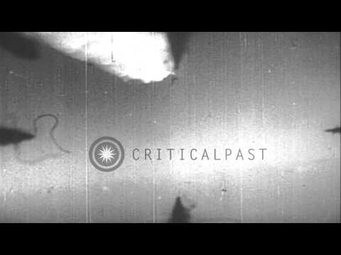 Aerial view of the chase of a Russian MIG Jet fighter plane by tracers during the...HD Stock Footage