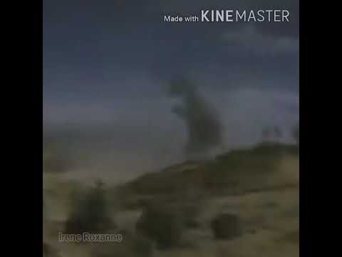 Godzilla walking up to Gigan and Megalon to beat their asses