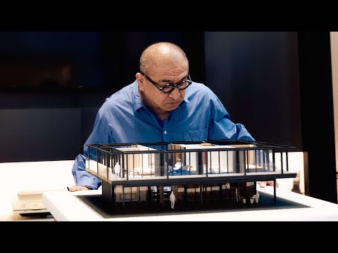 canapé-angle-cuir-cognac-kilim-lustre-maison-porte-fenêtre