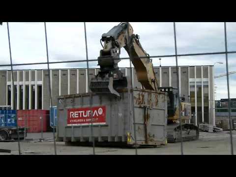 Cat 345C L Moving A Large Container