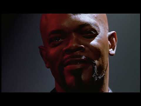 Shaft (2000) trailer still: Samuel L. Jackson as John Shaft strides through Times Square as the hi-hat groove kicks