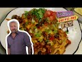 Guy Fieri Eats Chicken Chili Corn Chip Pie | Diners, Drive-Ins and Dives | Food Network