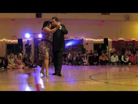 María del Carmen Romero  and  Jorge Dispari  are  dancing  to  a  milonga