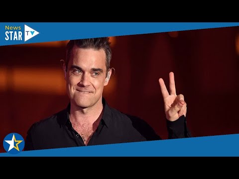 Robbie Williams thinking of wearing a wig on tour following failed hair transplant