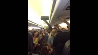 Stranded Airline Passengers, Crazy From Heat And Boredom, Start Singing