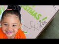 Stormi Writes Her Name On The Grinch Collection