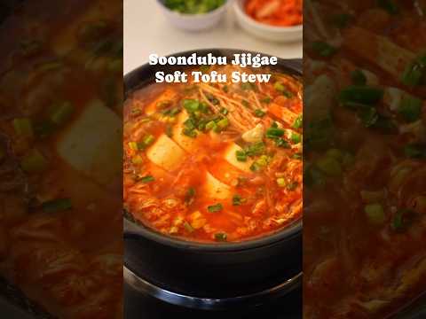 Soondubu Jjigae or Korean Soft Tofu Soup is a bowl of comfort simmered in savory and spicy broth.