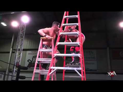 Richard Holiday Swinging Neckbreaker from a ladder to Tyler Cintron