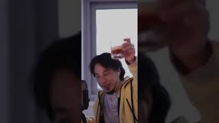 - 野良猫に餌をやる人