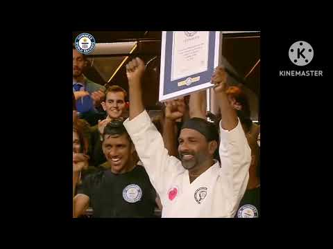 Guinnes World Records to KV Saidalavi for breaking coconut on head with nunchaku