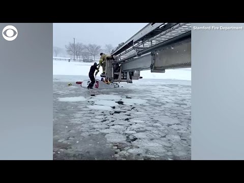WEB EXTRA: Firefighters Rescue Man And Woman From Car In Icy Water