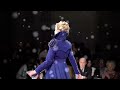 Blue Trenchcoat by Suzi Buki at Fashion Week London. Model Autumn Goldy