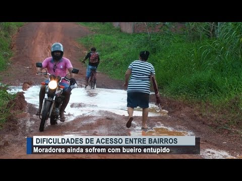 Bueiro entupido causa dificuldades de acesso entre bairros