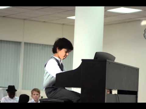 Kiumars Afrassiabi 8-year-old Piano Performance