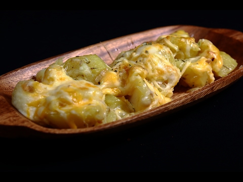 Patatas al ajillo gratinadas con queso