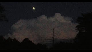 Unknown Object Flies into Lightning Clouds