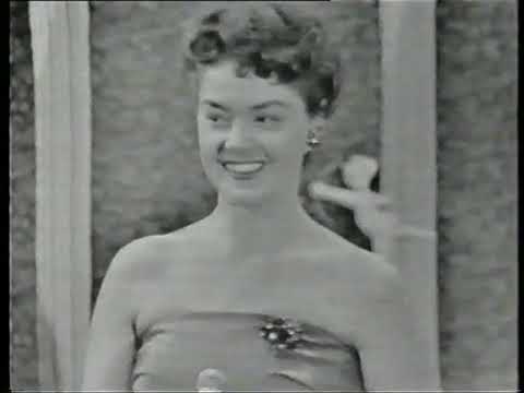 Teddy Scholten - 'n Beetje (Nationaal Songfestival 1959) fragment uit het NOS Journaal van 1-2-1999