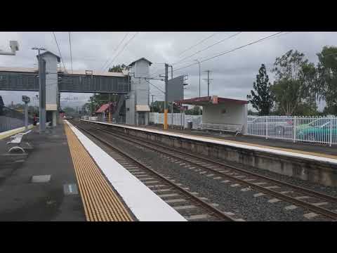 PNQ PN003 hauls TransPerth B Series Set 125 through Lawnton bound for Acacia Ridge.