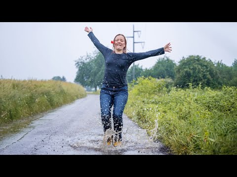 Summer rain walk in wet clothes