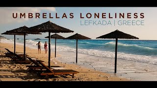 Umbrellas Loneliness at Sunset | Kathisma Beach, Lefkada Island, Greece