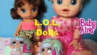 BABY ALIVE Bella shares a LOL doll with Charlie and they Open them up! BY BABY ALIVE CHANNEL BAC