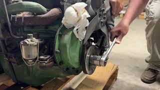 1940 Studebaker Champion Business Coupe hand cranking engine to show it turns freely