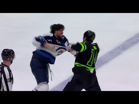 Jamie Benn drop the gloves with Brenden Dillon