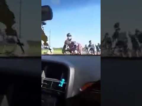 cyclists crash into parked car