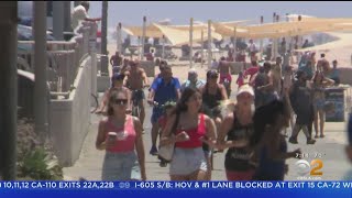 'This Is Amazing': Beach-Goers Head To Huntington Beach To Beat The Heat