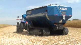 preview picture of video 'Farm Progress Show 2011 Combine Demo: New Holland Tractor and Kinze 1100 Tracked Grain Cart'