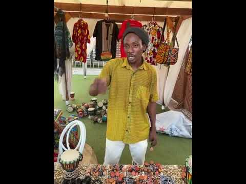 Ghanaian musician Moussa Diarra demonstrating how to play the kush kosh