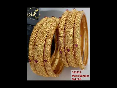 designer dresses and gold jewelry