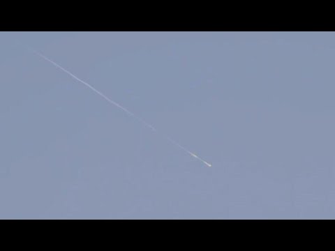 Video Thumbnail: Missile advances in Tel Aviv sky as sirens blare | AFP