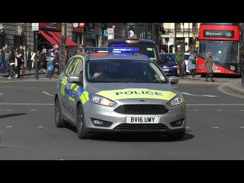 Police and Ambulances Responding with lights and sirens in London [Collection]