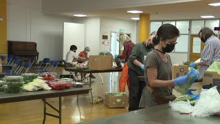 Community Food Support volunteers help feed the need one bag at a time