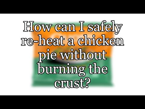 How can I safely re-heat a chicken pie without burning the crust?