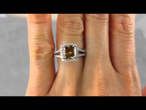 Charming 2.47 ctw with a 2.05 Cushion Cut Natural Chocolate SI1 Center Diamond