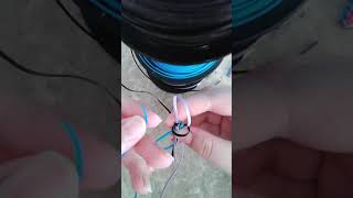How to make the twisted triangle with boondoggle (tutorial)