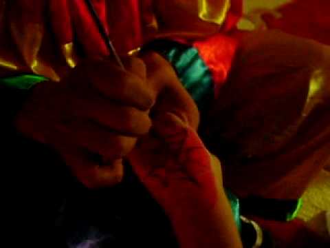 Roger clown while doing face painting.AVI