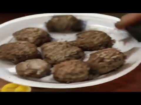 [AI] fat man eating meatballs in the house